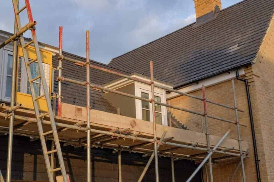 GWR Roofing Ltd roofer working on a pitched slate roof on a Victorian terraced property in Bristol